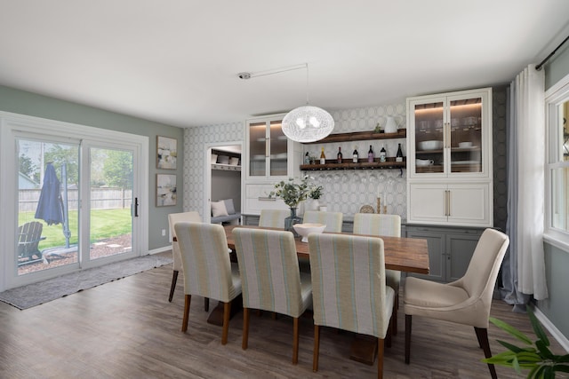 6235 George Fox Dr, Galloway, OH 43119 - dining area featuring wood finished floors and a chandelier