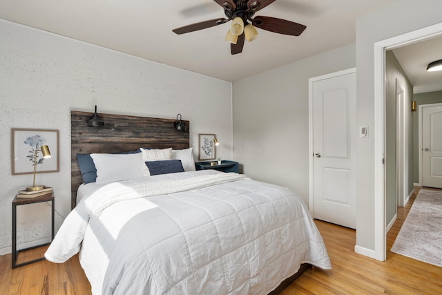 6235 George Fox Dr, Galloway, OH 43119 - bedroom with wood finished floors and a ceiling fan