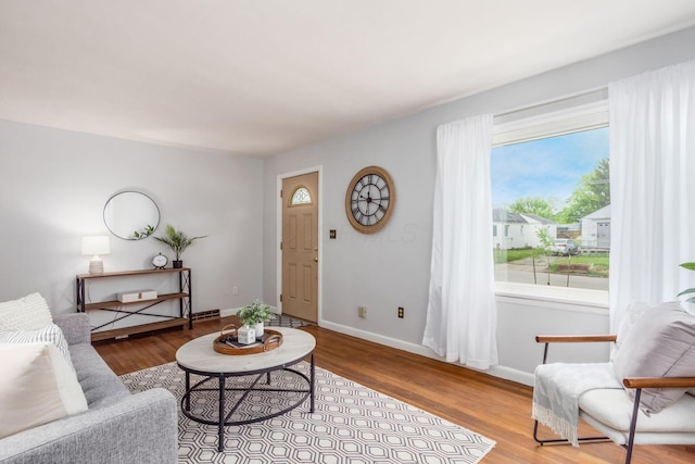 1310 Acton Rd, Columbus, OH 43224 - living room with wood finished floors and baseboards