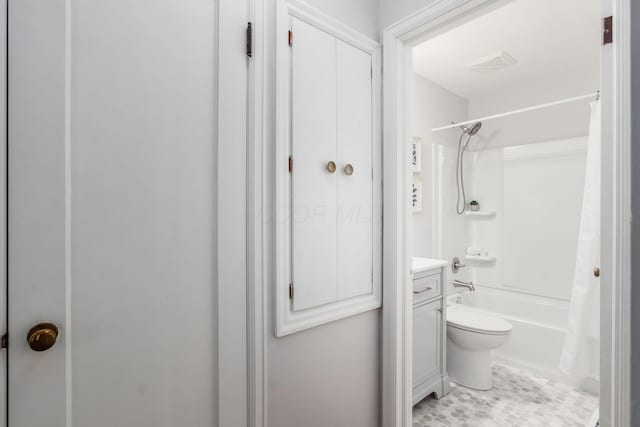 1310 Acton Rd, Columbus, OH 43224 - bathroom with vanity, shower / bath combo with shower curtain, and toilet