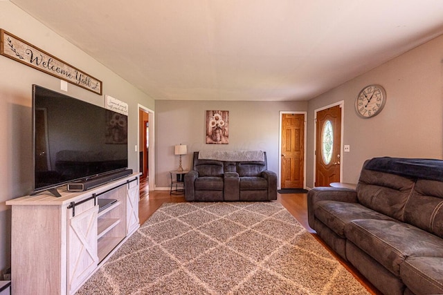 1485 E Choctaw Dr, London, OH 43140 - living area featuring wood finished floors and baseboards