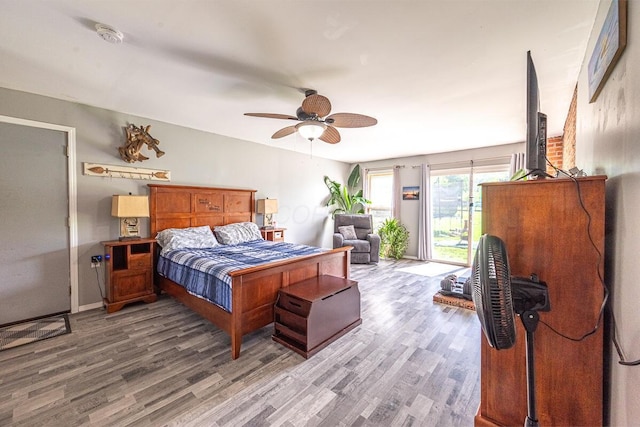 1485 E Choctaw Dr, London, OH 43140 - bedroom featuring light wood-style flooring, access to exterior, and ceiling fan