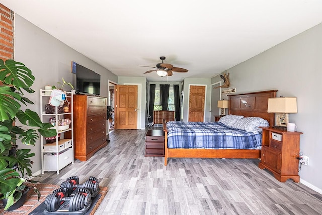 1485 E Choctaw Dr, London, OH 43140 - bedroom with wood finished floors, baseboards, and ceiling fan
