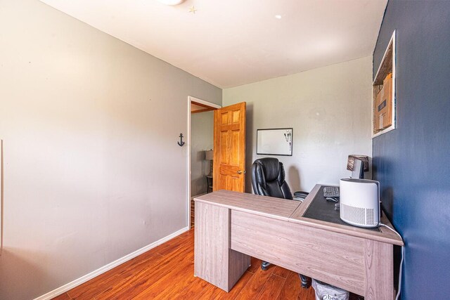 1485 E Choctaw Dr, London, OH 43140 - office area with wood finished floors and baseboards