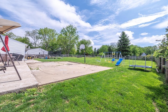 1485 E Choctaw Dr, London, OH 43140 - view of yard with a playground, a trampoline, and basketball court