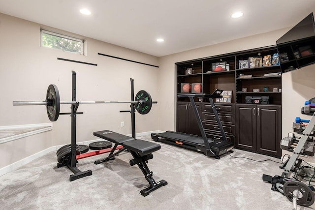 exercise room with carpet, baseboards, and recessed lighting