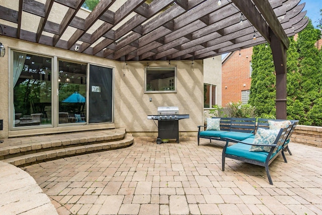view of patio featuring a pergola and grilling area