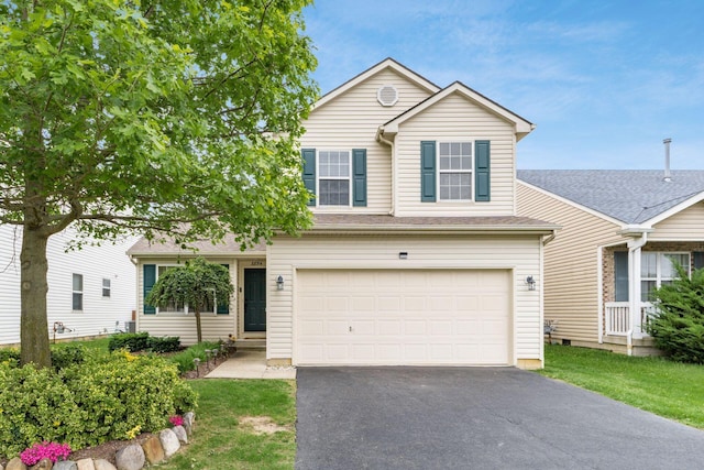3854 Sugarbark Dr, Canal Winchester, OH 43110 - traditional home with driveway, an attached garage, and a front lawn