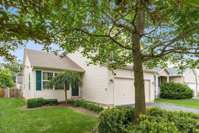 3854 Sugarbark Dr, Canal Winchester, OH 43110 - view of property hidden behind natural elements featuring driveway, a shingled roof, and a garage