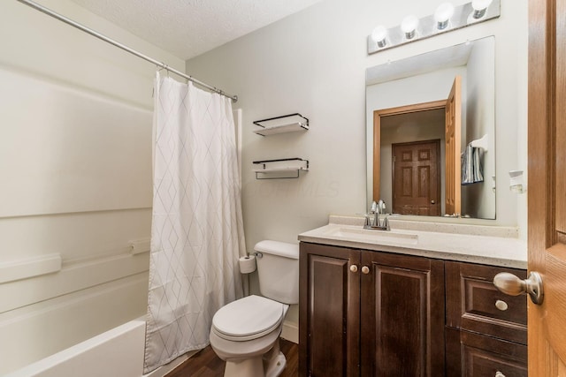 3854 Sugarbark Dr, Canal Winchester, OH 43110 - bathroom with toilet, vanity, wood finished floors, shower / tub combo, and a textured ceiling