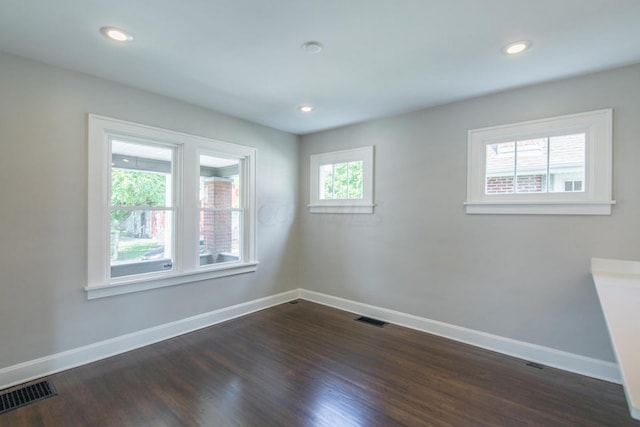 778 S 17th St, Columbus, OH 43206 - unfurnished room featuring baseboards, dark wood-type flooring, and recessed lighting