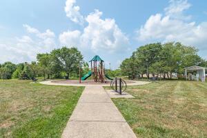 community play area featuring a yard