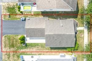 view of subject property with property parcel outlined