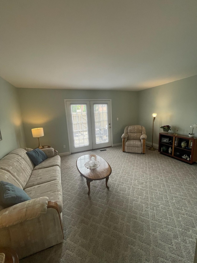 137 Tarryton Ct W Unit 24H, Columbus, OH 43228 - living area with carpet floors and baseboards