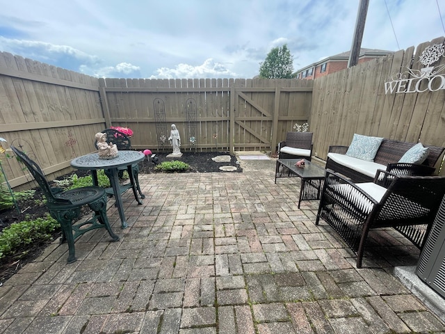 137 Tarryton Ct W Unit 24H, Columbus, OH 43228 - view of patio with a fenced backyard and a gate