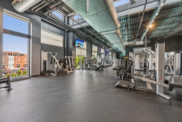 304 Cornelius St, Columbus, OH 43215 - workout area with a high ceiling and healthy amount of natural light