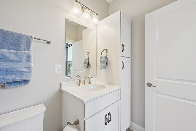 304 Cornelius St, Columbus, OH 43215 - bathroom featuring toilet and vanity
