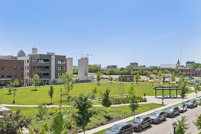304 Cornelius St, Columbus, OH 43215 - view of home's community with a city view and a lawn