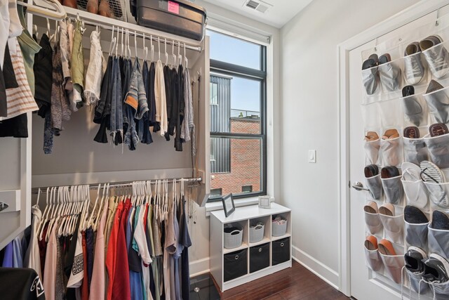 304 Cornelius St, Columbus, OH 43215 - spacious closet featuring dark wood finished floors