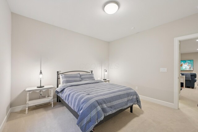 304 Cornelius St, Columbus, OH 43215 - bedroom featuring light colored carpet and baseboards