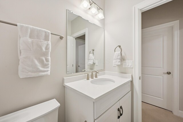 304 Cornelius St, Columbus, OH 43215 - half bathroom with vanity and toilet