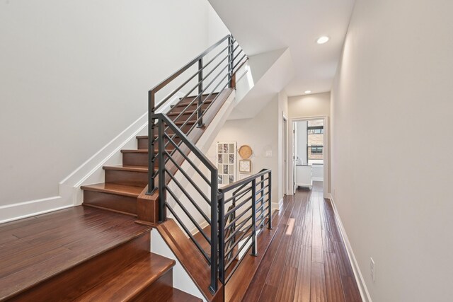 304 Cornelius St, Columbus, OH 43215 - staircase with hardwood / wood-style flooring, recessed lighting, and baseboards