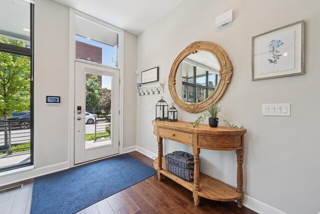 304 Cornelius St, Columbus, OH 43215 - entryway with dark wood-type flooring and baseboards