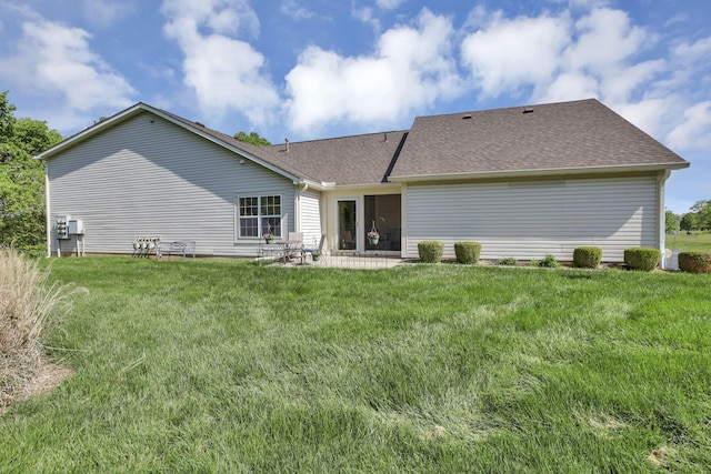 577 S Market St, Lithopolis, OH 43136 - rear view of house featuring a lawn, a patio, and roof with shingles