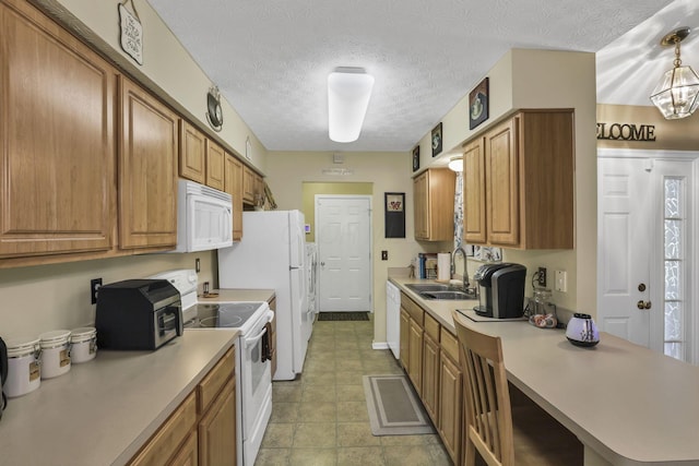 577 S Market St, Lithopolis, OH 43136 - kitchen featuring white appliances, a sink, brown cabinetry, light countertops, and a textured ceiling