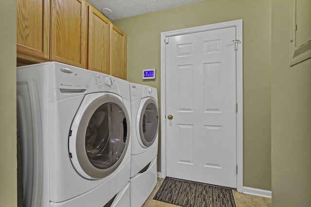 577 S Market St, Lithopolis, OH 43136 - laundry area with washing machine and clothes dryer, cabinet space, and baseboards