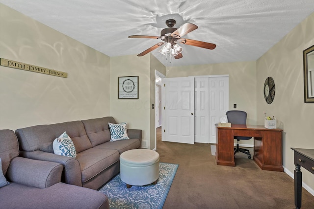 577 S Market St, Lithopolis, OH 43136 - carpeted living room with a desk, a ceiling fan, and baseboards