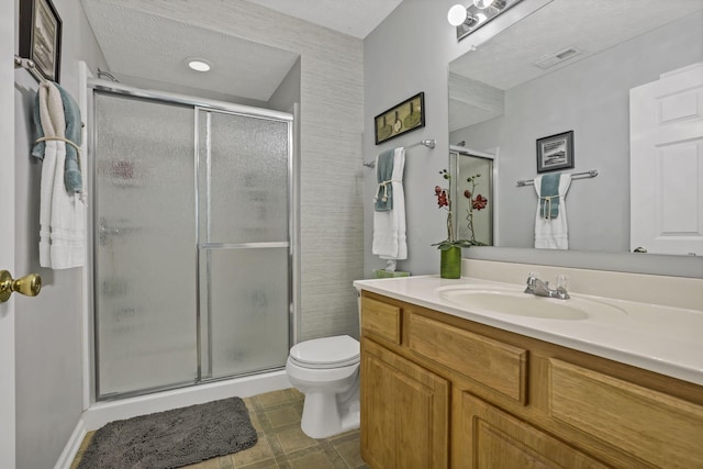 577 S Market St, Lithopolis, OH 43136 - bathroom with a shower stall, toilet, vanity, and a textured ceiling