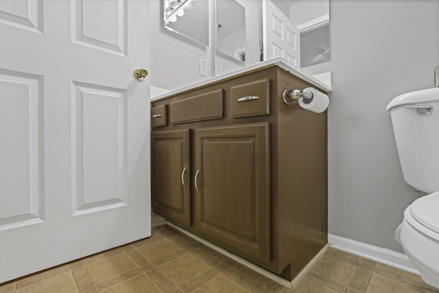 577 S Market St, Lithopolis, OH 43136 - bathroom featuring toilet and baseboards