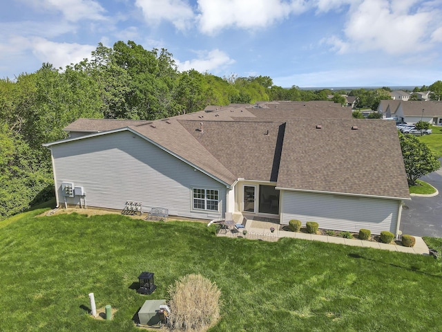 577 S Market St, Lithopolis, OH 43136 - rear view of property with a lawn and roof with shingles