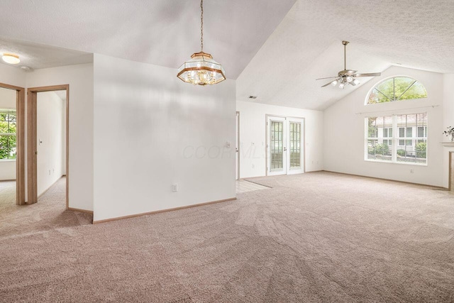 6323 Pinehurst Pointe, Westerville, OH 43082 - carpeted empty room with ceiling fan, healthy amount of natural light, a chandelier, a textured ceiling, and baseboards