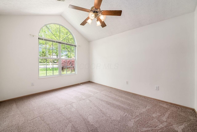 6323 Pinehurst Pointe, Westerville, OH 43082 - carpeted empty room featuring ceiling fan, lofted ceiling, baseboards, and a textured ceiling