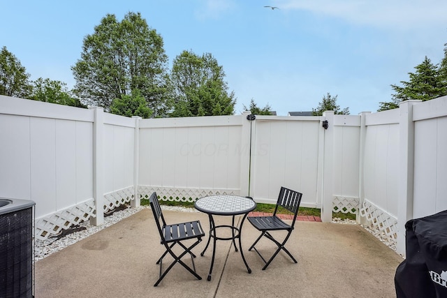 5210 Novelty Ave Unit 73D, Canal Winchester, OH 43110 - view of patio / terrace with fence and central air condition unit