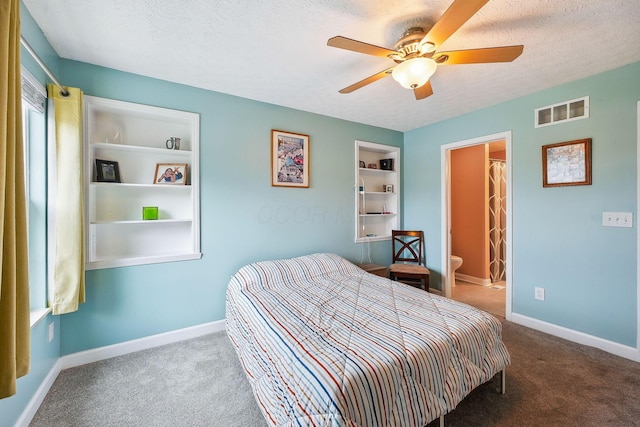 5210 Novelty Ave Unit 73D, Canal Winchester, OH 43110 - carpeted bedroom featuring a textured ceiling, baseboards, and ceiling fan