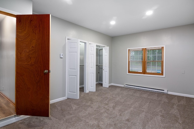 692 Millsboro Rd, Mansfield, OH 44903 - unfurnished bedroom featuring baseboard heating, carpet floors, baseboards, and recessed lighting