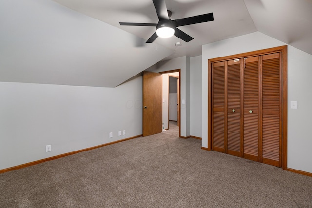 692 Millsboro Rd, Mansfield, OH 44903 - unfurnished bedroom featuring carpet, lofted ceiling, a closet, baseboards, and a ceiling fan