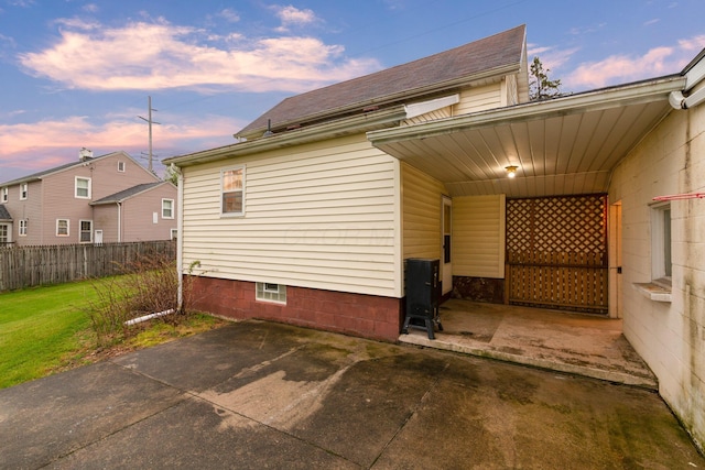 692 Millsboro Rd, Mansfield, OH 44903 - property exterior at dusk featuring a patio