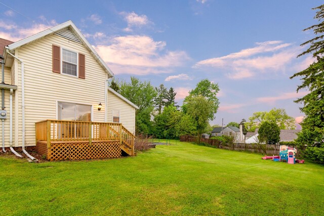 692 Millsboro Rd, Mansfield, OH 44903 - yard at dusk with a wooden deck