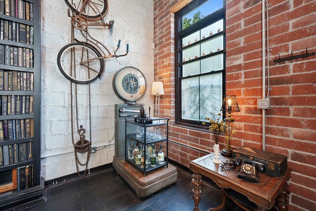 43-45 W Markison Ave, Columbus, OH 43207 - detailed view of wood finished floors and brick wall