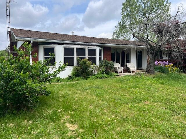 1886 Johnstown Utica Rd NE, Utica, OH 43080 - back of property with a lawn
