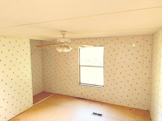 2785 Eckert Rd, Lexington, OH 44904 - spare room with ceiling fan and wallpapered walls