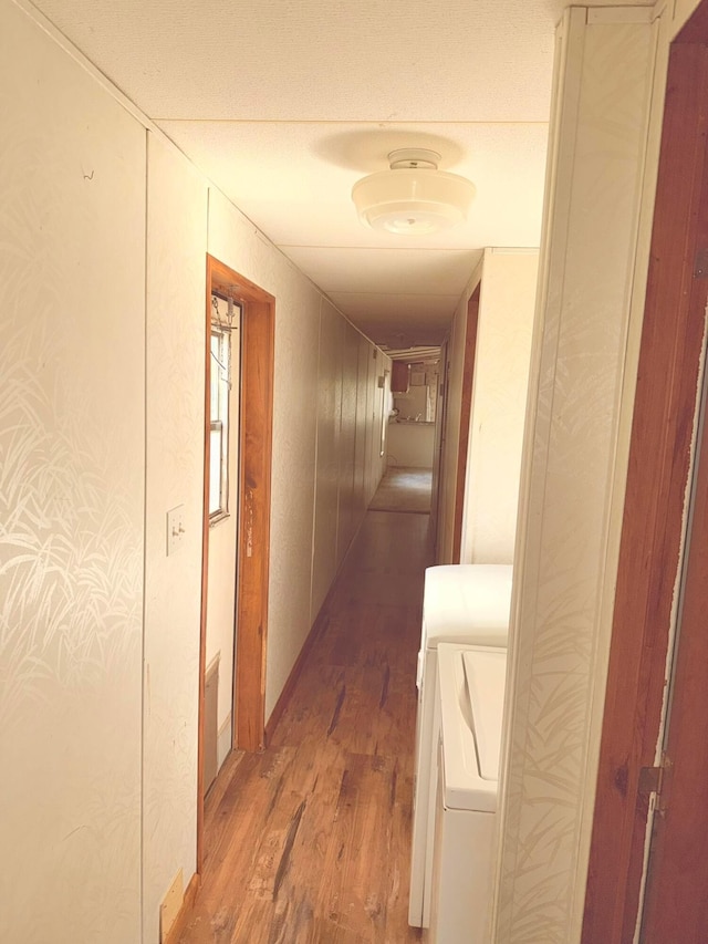 2785 Eckert Rd, Lexington, OH 44904 - corridor featuring light wood finished floors and separate washer and dryer
