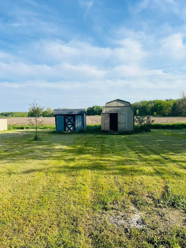 2785 Eckert Rd, Lexington, OH 44904 - view of green lawn with a shed, an outbuilding, and a rural view
