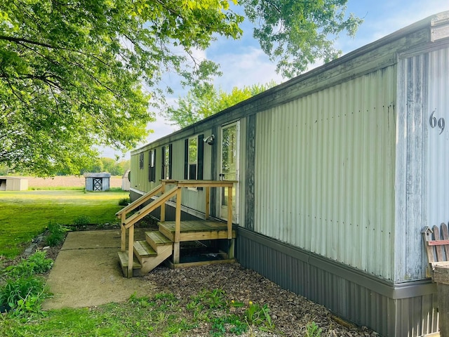 2785 Eckert Rd, Lexington, OH 44904 - view of home's exterior with a lawn