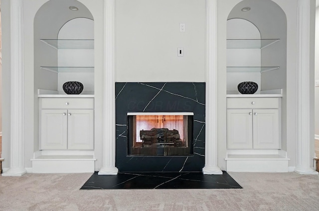 1940 Scioto Pointe Dr, Columbus, OH 43221 - detailed view of carpet floors, built in features, a fireplace with flush hearth, and decorative columns