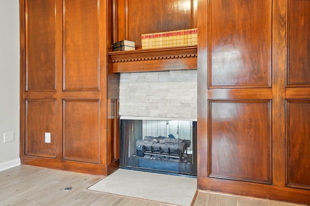 1940 Scioto Pointe Dr, Columbus, OH 43221 - detailed view of a multi sided fireplace, wood finished floors, and baseboards